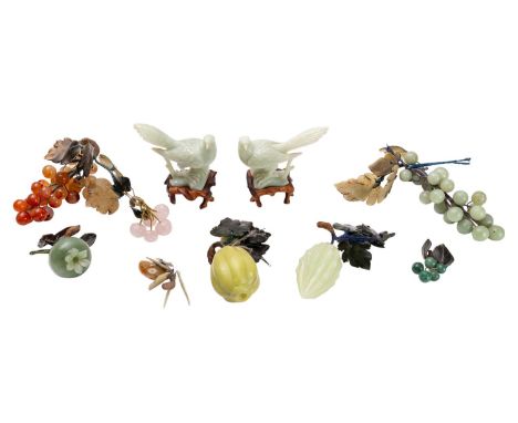 A collection of 'The Famous Peking Fruits' in jade and hardstones together with a pair of similar carved birds with booklet i
