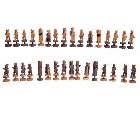 A Swiss carved and stained softwood Bears of Berne chess set, first half 20th century; the anthropomorphised animals portraye