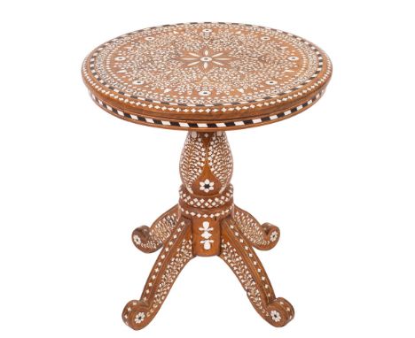 An Anglo Indian sandalwood and ivory inset occasional table, first quarter 20th century; the circular top with central floral