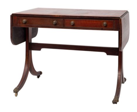 A George III rosewood and cross banded sofa table, circa 1800; the rectangular top with twin drop leaves with rounded corners