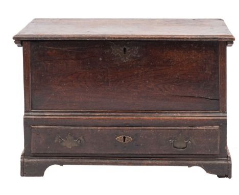 An 18th-century oak cofferbach; with a rectangular moulded hinged top, single drawer at base, on bracket feet; 44cm high, 66c
