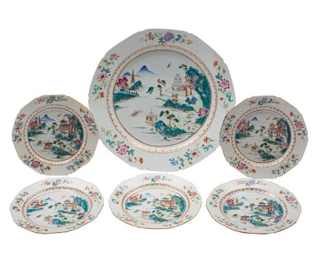 A Chinese famille rose charger and five matching plates with shaped rims, each painted with an extensive pagoda lake landscap