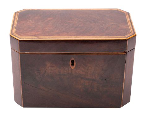A George III mahogany tea caddy, late 18th century; rectangular, with canted angles and line inlaid borders; the interior wit
