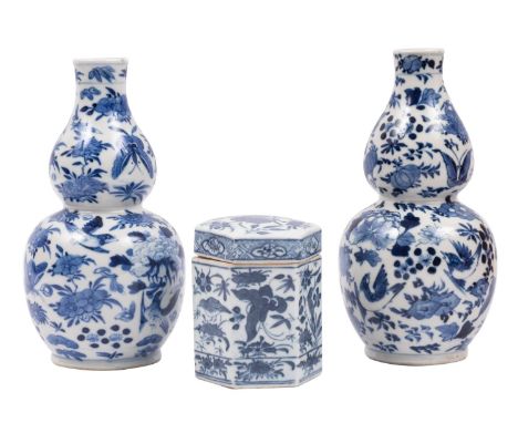 A pair of Chinese blue and white double gourd vases and a similar hexagonal box and cover all painted with birds, fruit and f