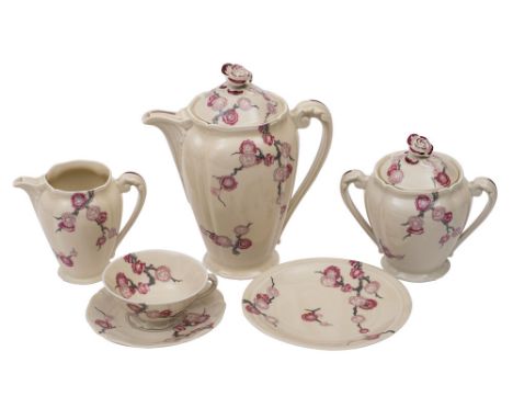 A Limoges porcelain coffee service, comprising a coffee pot and cover, sucrier and cover, milk jug nine cups, ten saucers and