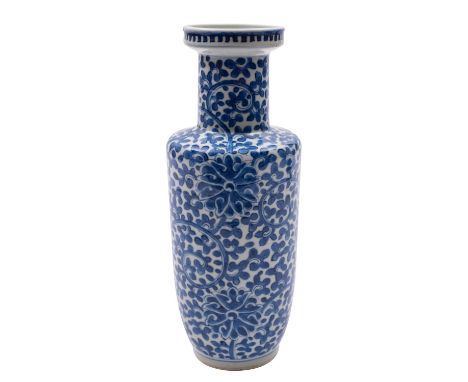 A Chinese blue & white rouleau vase, late Qing dynasty painted with scrolling lotus flowers and foliage, apocryphal four-char