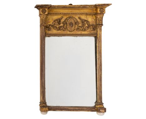A Regency giltwood and gesso framed overmantel mirror, early 19th century; the moulded cornice of reverse breakfront outline,