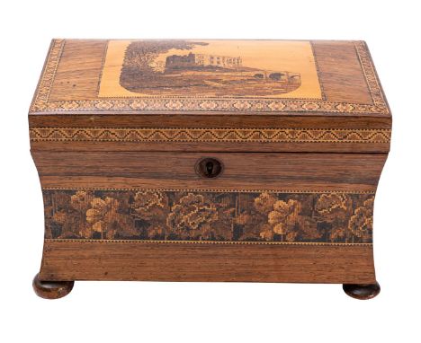 A Victorian rosewood and Tunbridgeware tea caddy, circa 1875; the hinged and slightly domed cover with a depiction of Carew C