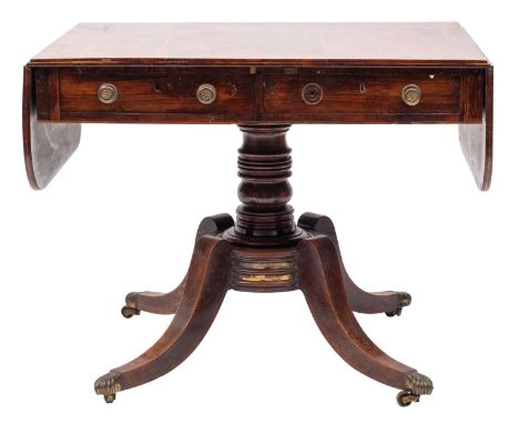 A Regency rosewood and inlaid sofa table; bordered with satinwood lines, the hinged top with rounded corners and a crossbande