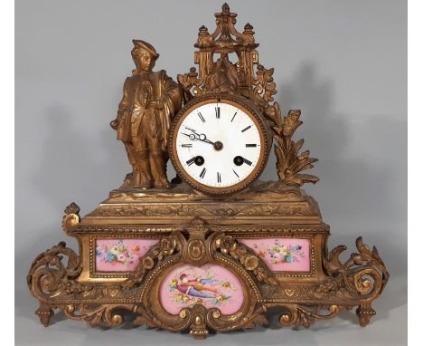 A Victorian gilt brass mantel clock enclosing French porcelain panels, probably by Sevres, with enamelled dial and eight day 