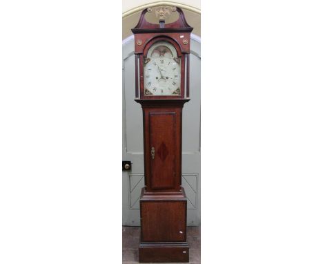 A Georgian oak and cross  banded longcase clock, with reeded and moulded trunk and arched hood, with architectural pediment e