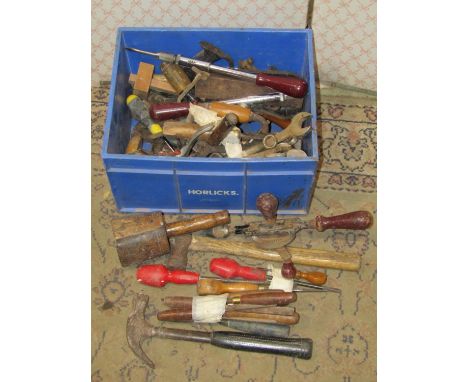 A plastic crate containing a quantity of mainly woodworking related hand tools to include Marples and other chisels, etc 