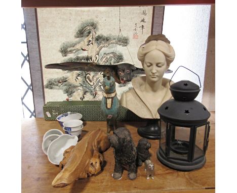 A marble effect bust of a woman, a blue and white Japanese tea service, a Japanese wall  hanging, a carved wooden lizard, a l