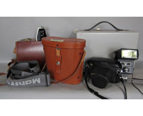 Photographic equipment including a Pentax SP500, a Bolex cine camera, a pair of binoculars and a Leitz projector 