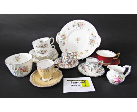 A collection of Minton Marlow pattern tea wares comprising cake plate, milk jug, sugar bowl, six cups, six saucers and six te