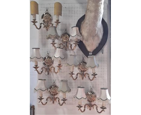 A set of six contemporary brass, two branch wall lights, four further single branch wall lights with painted finish and a bra
