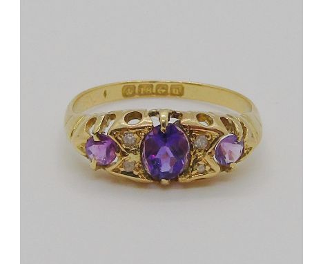 Early 20th century 18ct amethyst and diamond ring, size K, 2.1g 