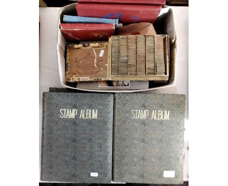 Four stamp albums dating from the 1950s onwards containing British and worldwide stamps including Commonwealth examples, thre