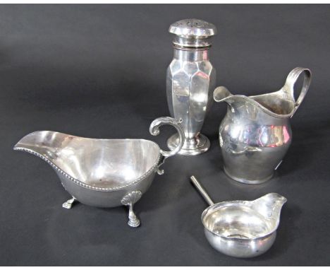 A mixed collection of 19th century silver; a sauce boat, milk jug, sugar sifter and wine ladle, 15 oz approximately (4) 