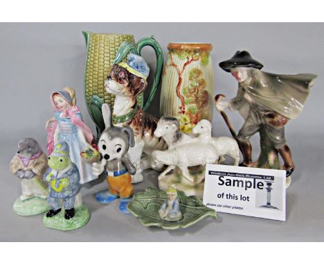 A collection of decorative ceramics including a 19th century continental humorous model of a seated dog, with impressed numbe