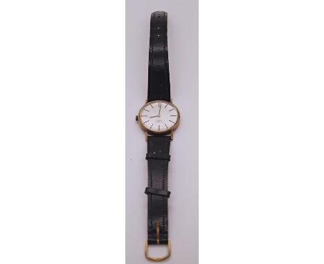 A gent's Rotary 9ct presentation wrist watch, inscription to back of case 