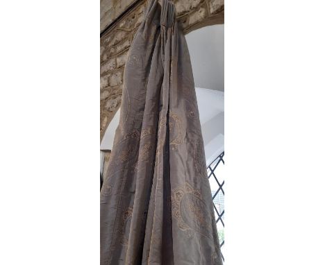 1 pair of good quality extra long curtains with paisley/ boteh type motifs on a mushroom ground. Lined and thermal lined with