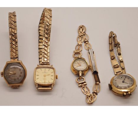 A vintage ladies 18ct watch, a 9ct gold Hirco ladies watch, a further 9ct Garrard example and a plated Rotary example, all wi