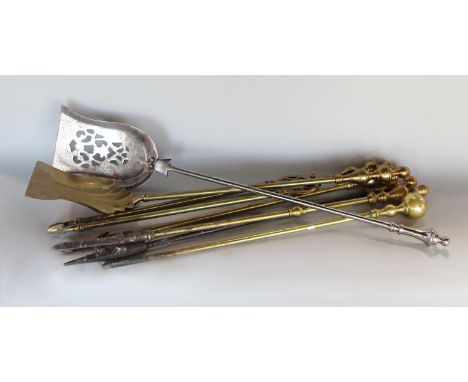 A mixed selection of 19th century fire tools, two shovels, four pokers and a pair of tongs (7) 