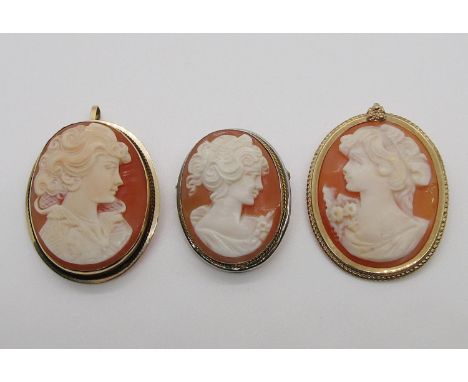 Three vintage cameo brooches; a 14ct (5.7g), a 9ct (6.4g) and a 900 silver example (3) 