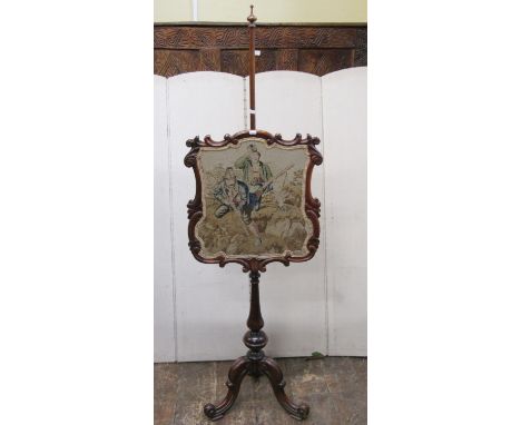 Victorian face screen with rosewood framework upon a tripod base, the screen in tapestry showing Victorian huntsman in a land