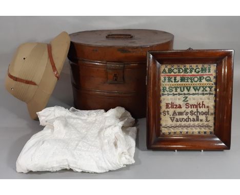 Mixed lot including a vintage painted tin hat box containing a Calcutta made pith hat, an early 20th century christening gown