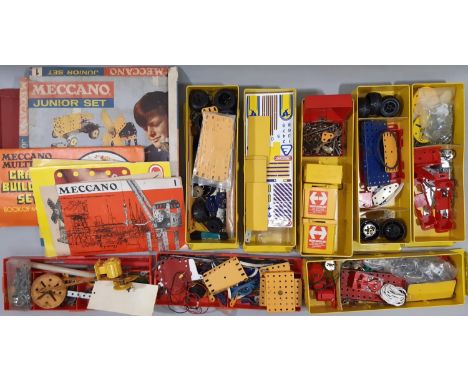 Boxful of vintage Meccano including 6 yellow storage tins, boxed Meccano Junior set (AF- incomplete) etc 