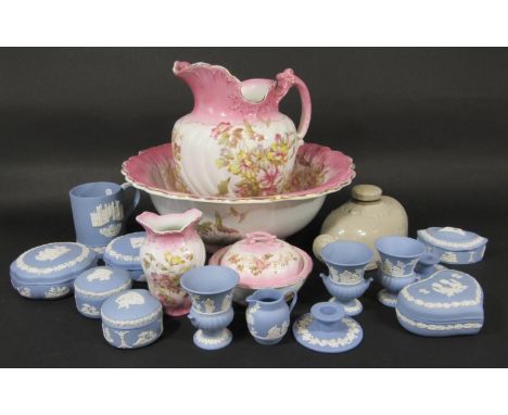 A quantity of Wedgwood blue ground jasperwares including a pair of circular boxes and covers, a pair of kidney shaped boxes a
