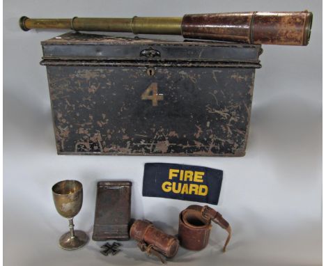 A German World War II 98k Mauser Rifle cleaning kit, a leather and brass military issue telescope made by Beck Ltd 1918, a sm