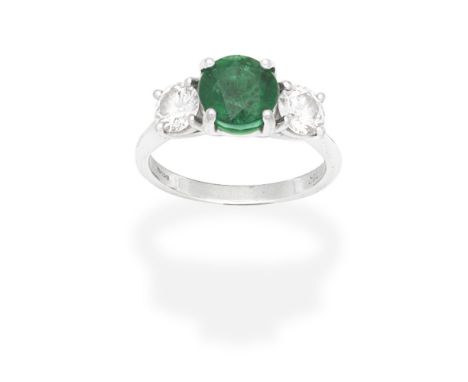 EMERALD AND DIAMOND THREE STONE RINGThe circular-cut emerald between brilliant-cut diamonds, diamonds approx. 1.25cts total, 