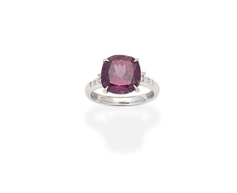 TOURMALINE AND DIAMOND RINGSet with a cushion-shaped purple tourmaline between shoulders set with brilliant-cut diamonds, rin