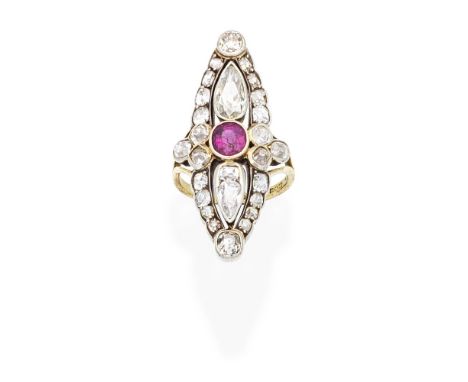 DIAMOND AND RUBY DRESS RING, 1860The navette-shaped plaque set with cushion and pear-shaped diamonds and a circular-cut ruby,