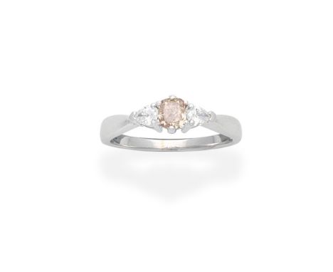 FANCY COLOURED DIAMOND AND DIAMOND RINGSet with a cushion-shaped Fancy Pinkish Brown diamond, weighing 0.58 carat, between pe