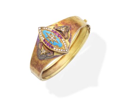 ENAMEL, RUBY, DIAMOND AND SEED PEARL BANGLE,  CIRCA 1870The hinged bangle decorated with blue and black enamel, rose-cut diam