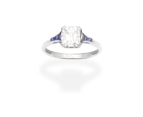 DIAMOND AND SAPPHIRE RINGThe Asscher-cut diamond between shoulders set with calibré-cut sapphires, diamond approx. 1.00ct,  r