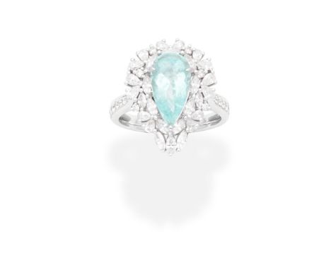 TOURMALINE AND DIAMOND CLUSTER RINGThe pear-shaped blue tourmaline, within a surround of marquise, pear and brilliant-cut dia