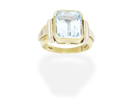 AQUAMARINE RINGThe step-cut aquamarine within a bi-coloured mount, ring size approx. N½ For further information on this lot p