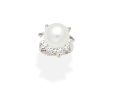CULTURED PEARL AND DIAMOND CLUSTER RINGThe 13.5mm cultured pearl set within a pear-shaped diamond surround, diamonds approx. 