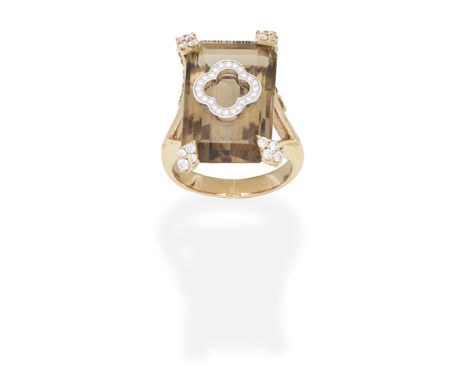 SMOKY QUARTZ AND DIAMOND-SET DRESS RINGThe rectangular step-cut smoky quartz, with a brilliant-cut diamond quatrefoil to the 