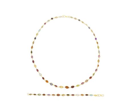 MULTI GEM-SET NECKLACE AND BRACELET SUITEThe necklace spectacle set with various oval-cut gemstones including peridot, amethy