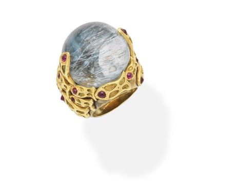 AQUAMARINE AND RUBY DRESS RINGRepresenting the sea, the aquamarine sphere in a foiled  closed back setting,  the mount decora