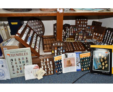 A LARGE GROUP OF COLLECTABLE THIMBLES AND COLLECTOR MAGAZINES to include nineteen displays of collectable thimbles of various