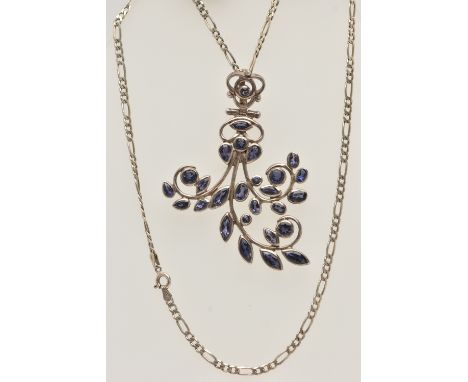A LARGE WHITE METAL GEM SET PENDANT WITH CHAIN, the large open work floral pendant set with circular, oval and marquise cut b