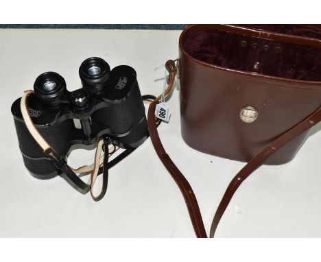 A PAIR OF CARL ZEISS FIELD GLASSES, with brown leather case, Carl Zeiss-Jena, 10x 50W, serial number 4315810, made in DDR (Ge