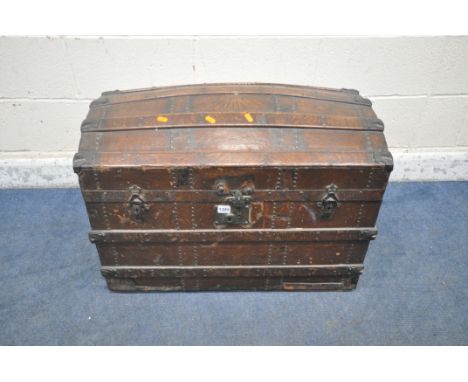A VINTAGE WOODEN DOMED TRUNK, with twin metal handles, width 78cm x depth 48cm x height approximately 67cm (condition report: